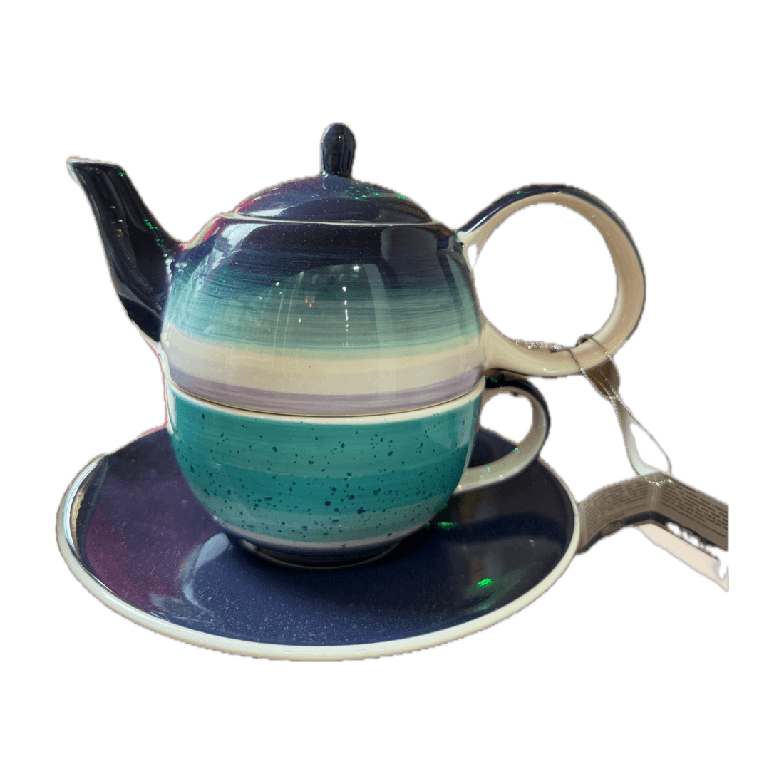 Set aus Kanne, Tasse und Untertasse mit blau-grünem Farbverlauf.